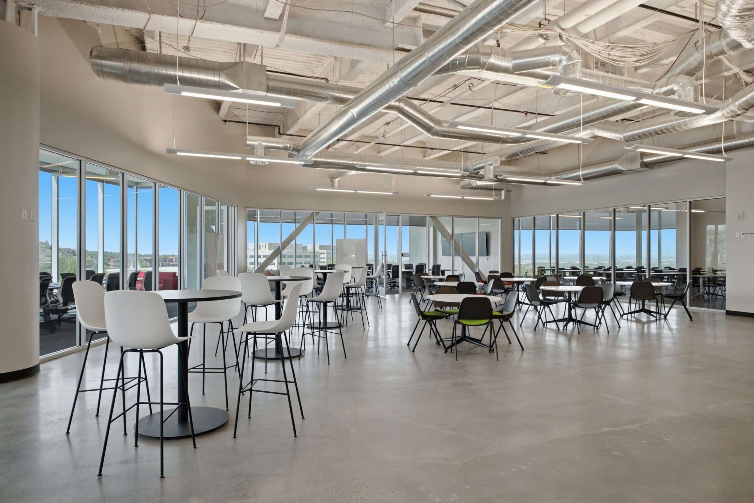 Open collaboration area between focused work zones
